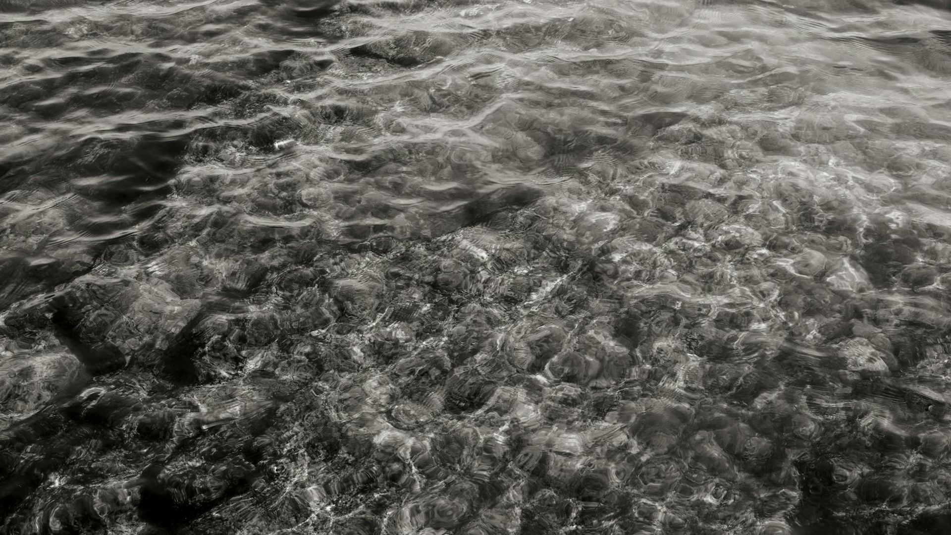 Abstract background with soft light flares suggesting clarity.